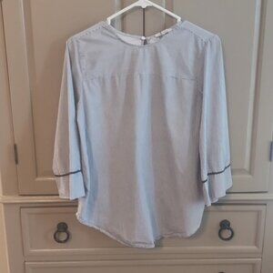 Zara top with "shop around" on the back size medium